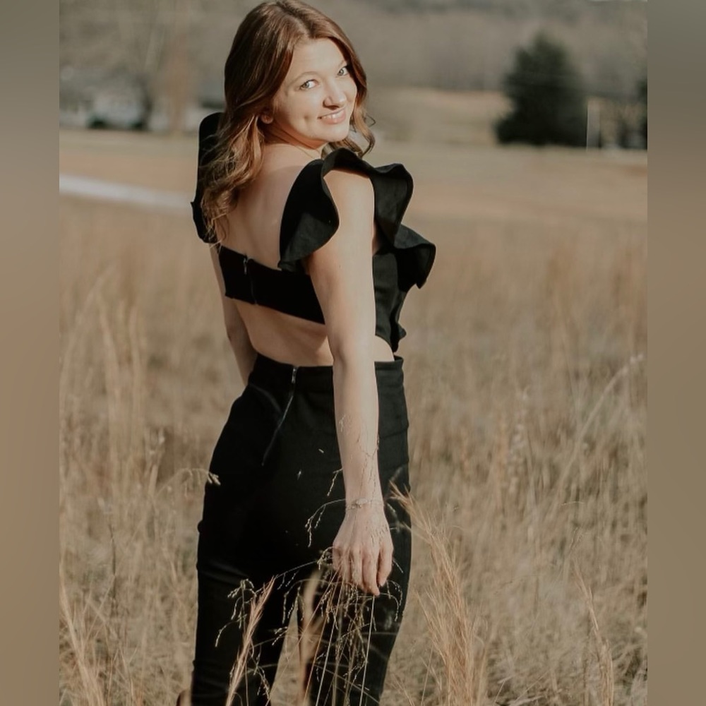 Boutique- Black Jumper - Backless with ruffle sleeve, flare leg, zipper in back